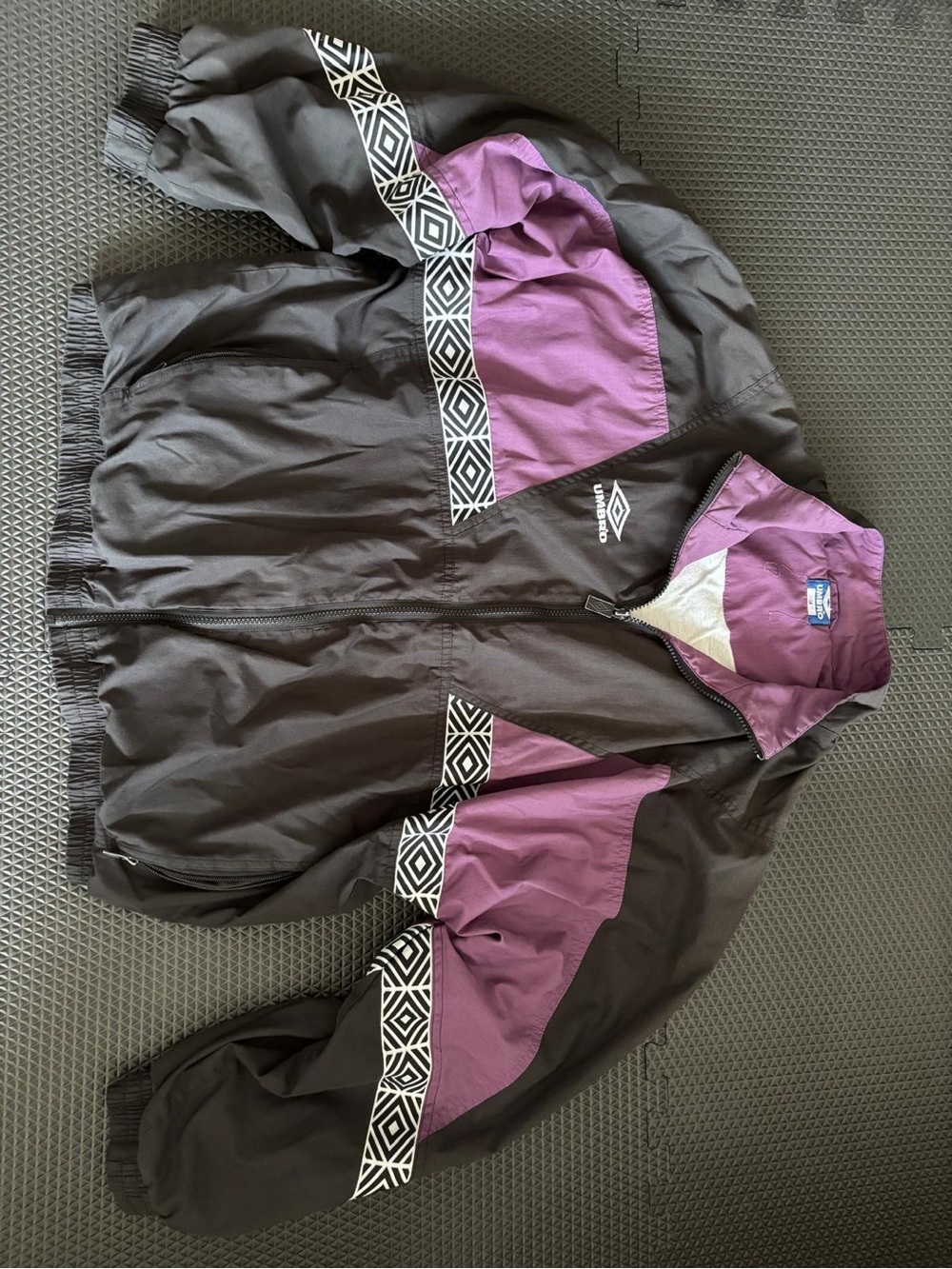 Umbro Black and Purple Kids' Rain Jacket with Graphic Trim
